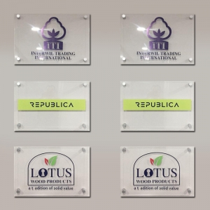 Acrylic prints on a clear perspex sign with wall mounts.